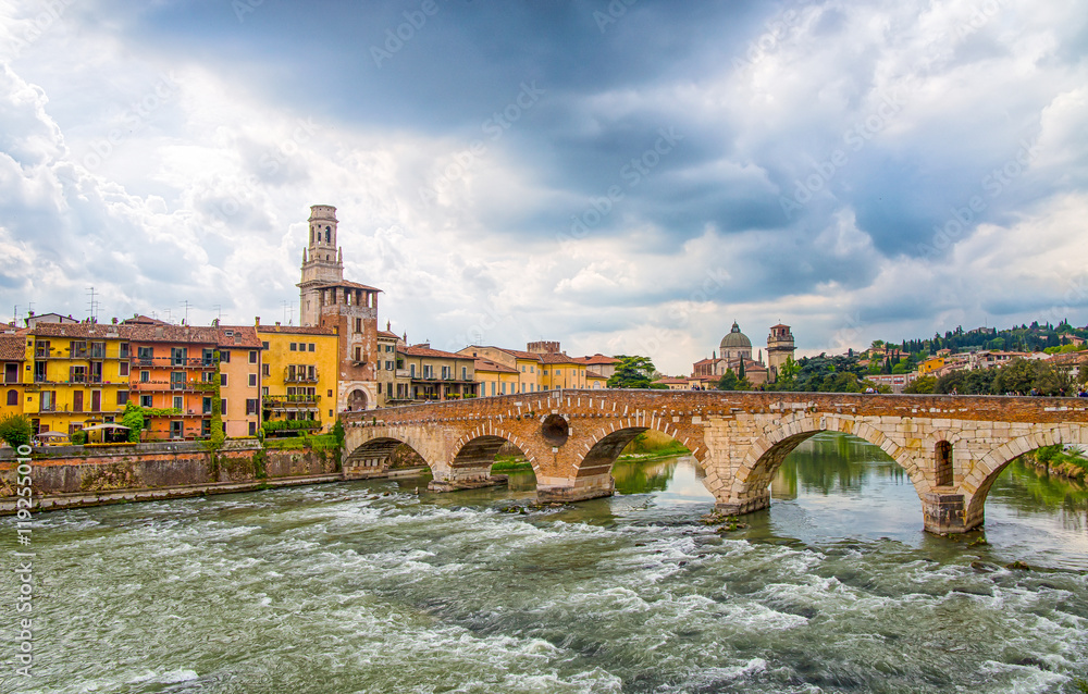 View of  Ponte Pietra (Stone Bridge)  on the Adige river, Verona Italy