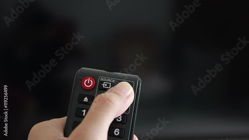Close Up Shot Asian Woman Hand Using Remote Control To Turn On TV