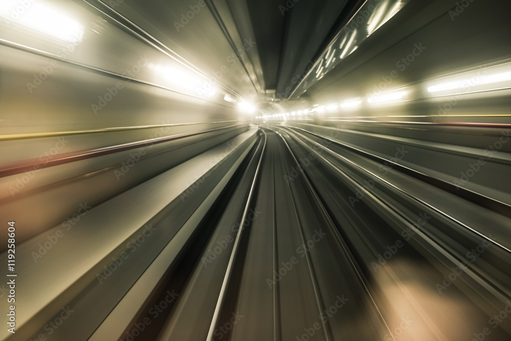 Fast underground train riding in a tunnel of the modern city Fast underground train riding in a tunnel of the modern city