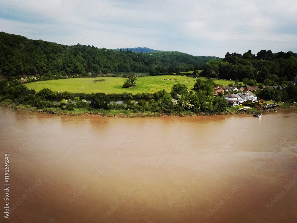 View of brown river and countryside from Chepstow Castle View of brown river and countryside from Chepstow Castle