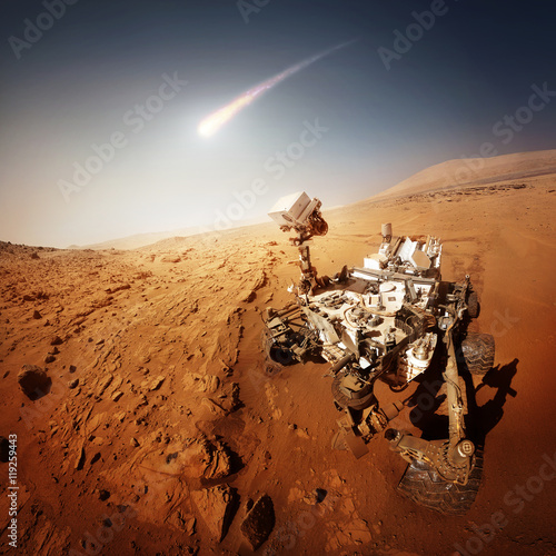 Fototapeta Naklejka Na Ścianę i Meble -  Mars Rover explores the red planet. Elements of this image furnished by NASA.