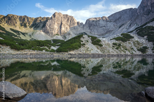 Panorama around Sinanitsa peak and reflectionin the lake, Pirin Mountain, Bulgaria