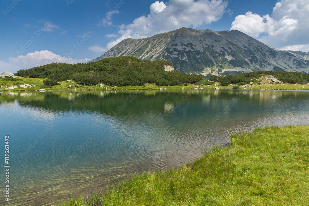 Amazing landscape of todorka peak and Reflection in Muratovo lake, Pirin Mountain, Bulgaria Amazing landscape of todorka peak and Reflection in Muratovo lake, Pirin Mountain, Bulgaria