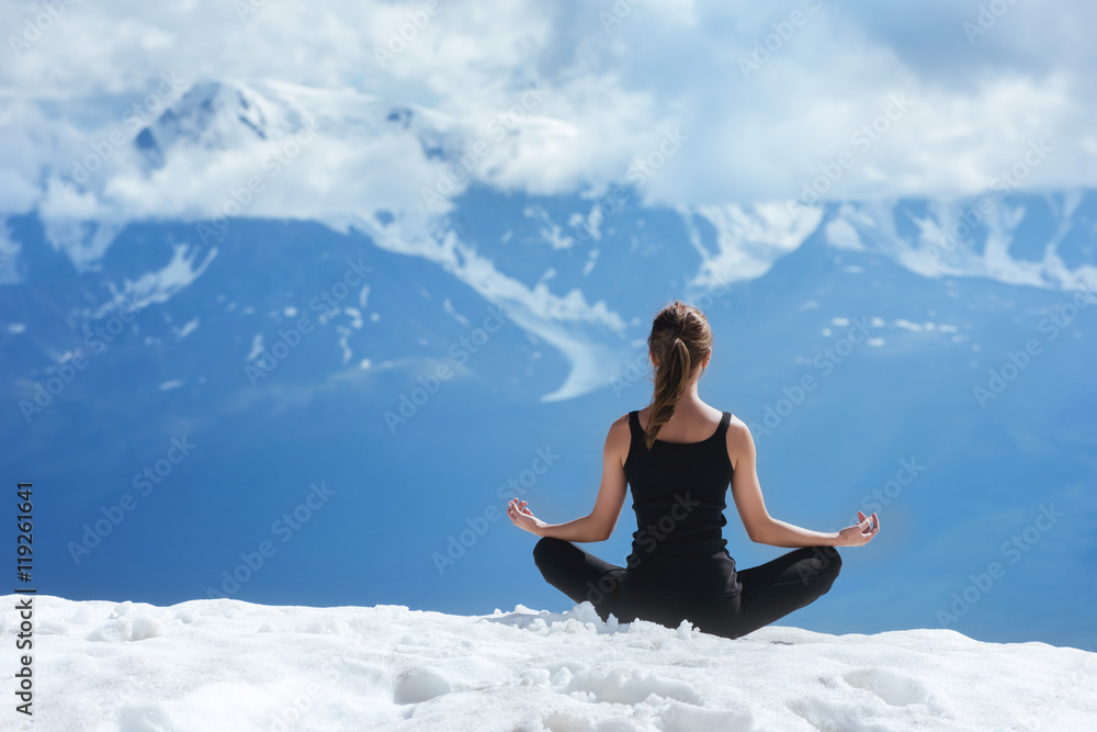 Yoga woman on the mountains background Yoga woman on the mountains background