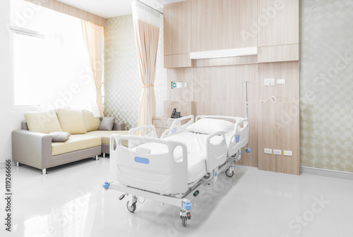 Hospital room with beds and comfortable medical equipped  photo