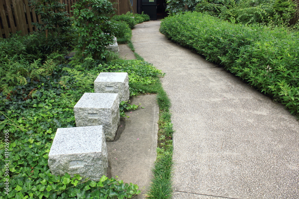 Path and stone benches in Japanese garden