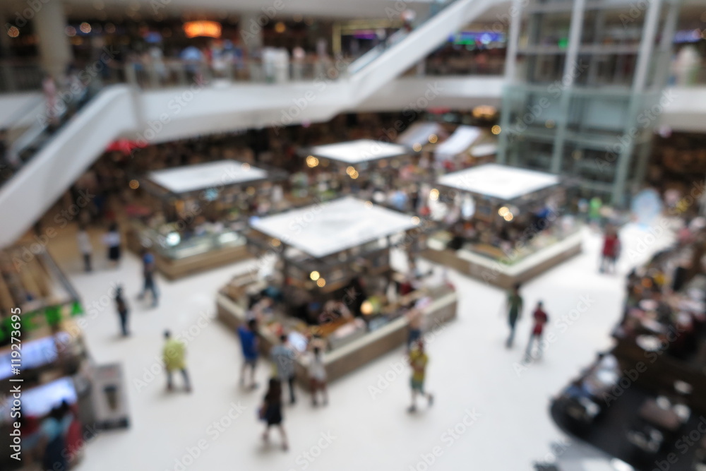 Shopping mall, modern trade interior design with people in blur background