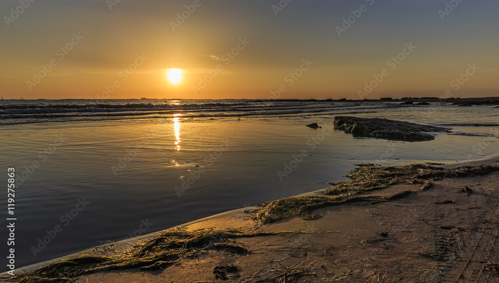 Coast beach in the Caspian Sea near Baku at sunrise.Azerbaijan Coast beach in the Caspian Sea near Baku at sunrise.Azerbaijan