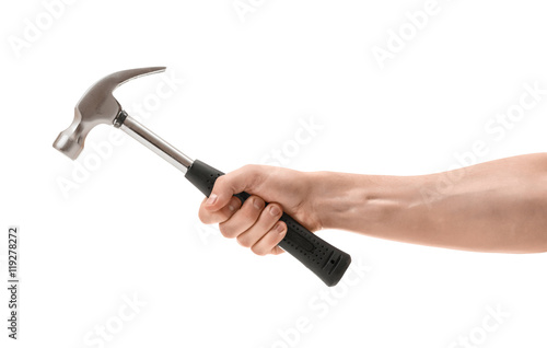 Fototapeta Close-up view of a man's hand holding hammer, isolated on white background