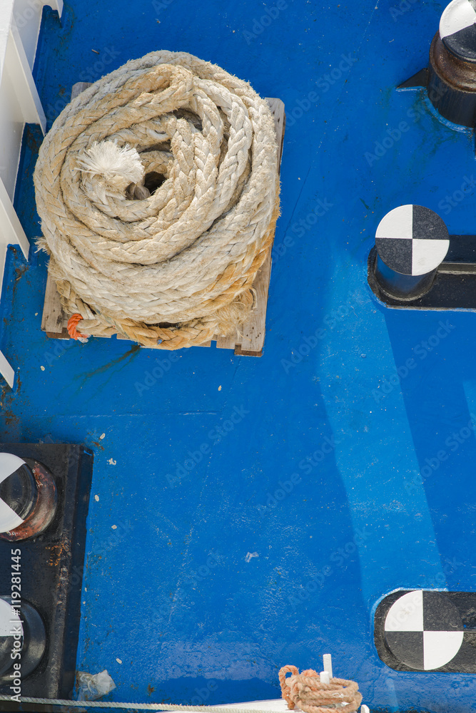 Detail of ropes and tie rods on the deck of the ship