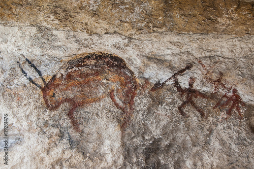 Wall cave with drawings of the primitive person