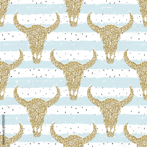 Hand drawn repeat  pattern. Gold glitter skulls on striped scribble background