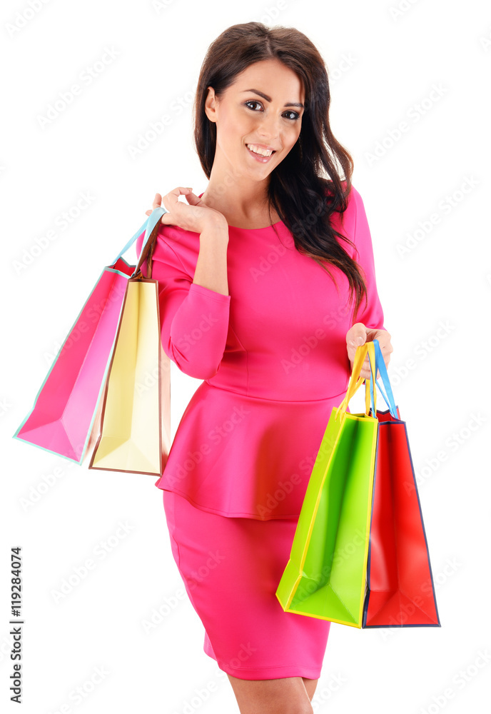 Young woman with paper shopping bags isolated on white Young woman with paper shopping bags isolated on white