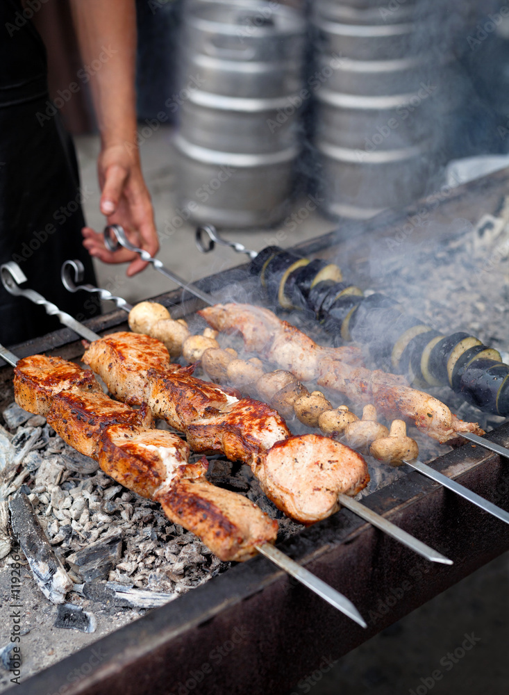 Preparation of barbecue meat shish kebab on skewers grill food