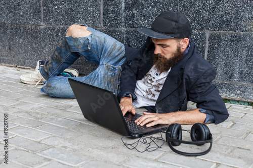 Canvas Print Vagrant with computer