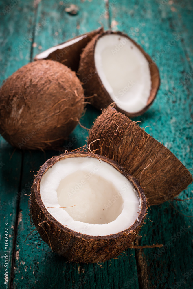 Coconut on wooden table.