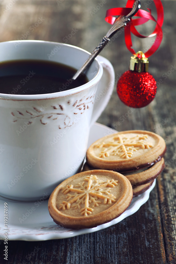 Cup of coffee and christmas sugar cookies