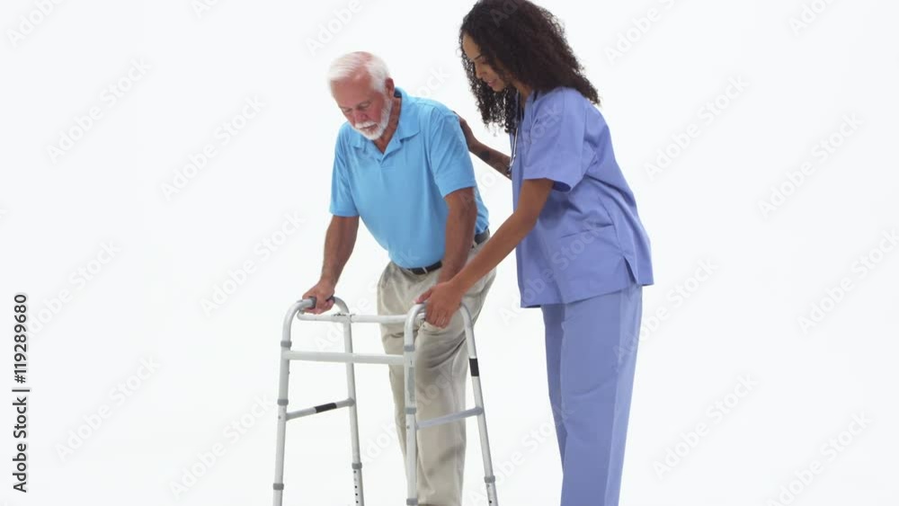 Nurse helping elderly patient with walker Nurse helping elderly patient with walker