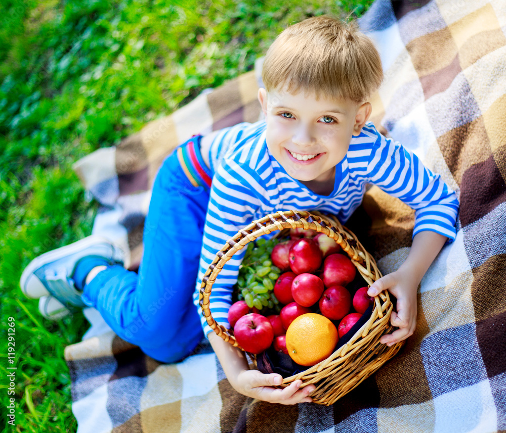 Fototapeta premium boy with fruit outdoor