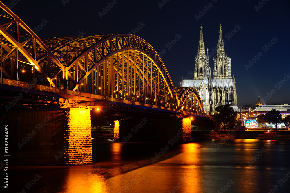 Obraz premium Cologne Cathedral (Dom) and Hohenzollern Bridge, Cologne, Germany