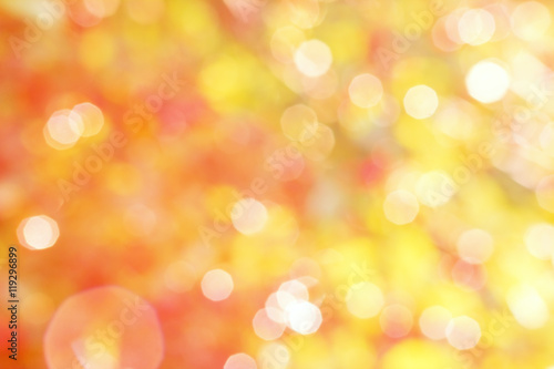 Abstract yellow and red background with white bokeh