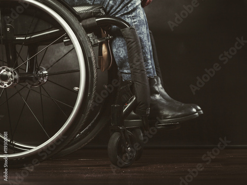Legs of disabled person.