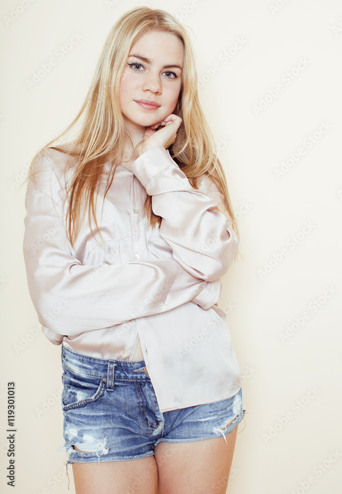 young pretty blond teenage girl close up portrait, lifestyle people concept young pretty blond teenage girl close up portrait, lifestyle people concept