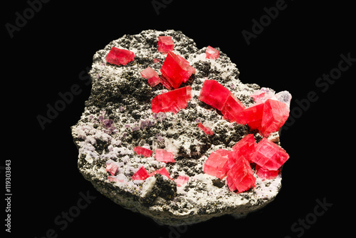 Bright Red Rhodochrosite Mineral against Black Background photo