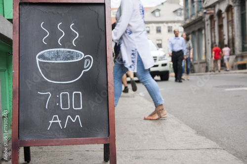 Coffee chalkboard sign outside cafe
