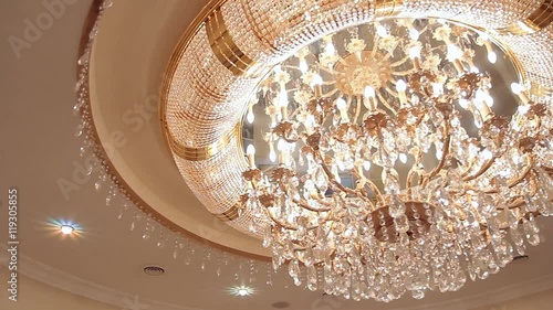 Luxury crystal chandelier on the ceiling