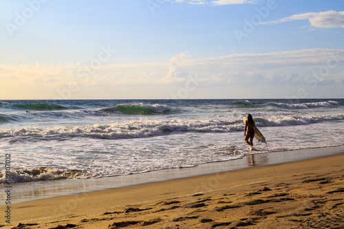 Φωτογραφία Nag's Head Beach in the morning with surfers