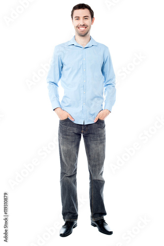 Casual young guy, full length portrait.