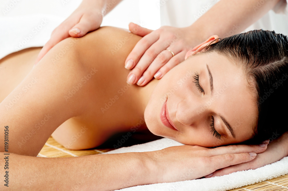 Relaxing massage of back for young beautiful woman Relaxing massage of back for young beautiful woman