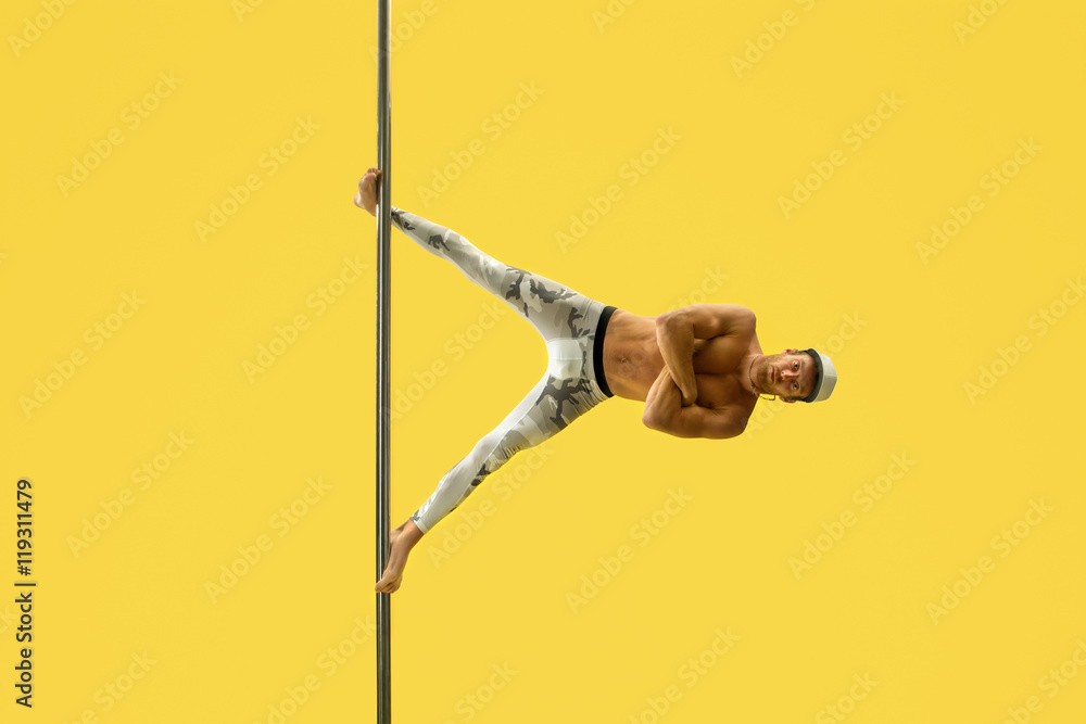 Acrobat performs trick and his face is relaxed Stock Photo | Adobe Stock