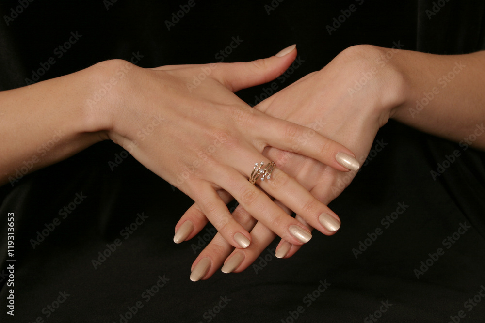 female hand holding fingers diamond ring female hand holding fingers diamond ring