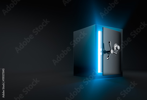 Ray of light shining through an opened safe box photo