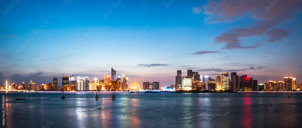 cityscape and skyline of hangzhou from water