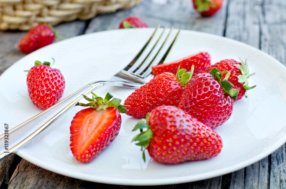 Ripe red strawberries on wooden table Ripe red strawberries on wooden table