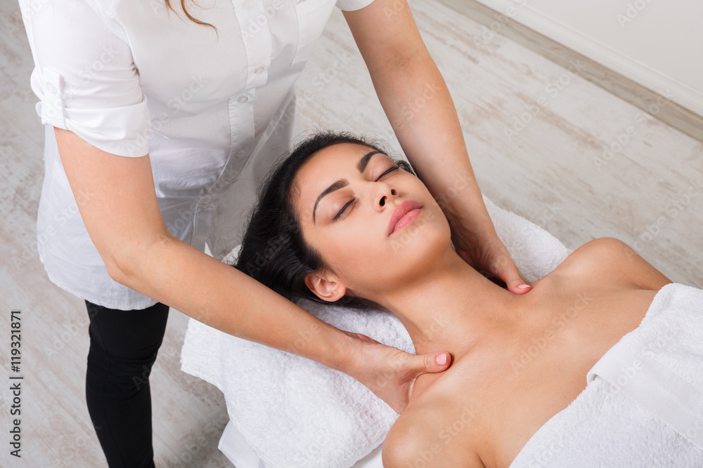 Woman beautician doctor make body massage in spa wellness center Woman beautician doctor make body massage in spa wellness center