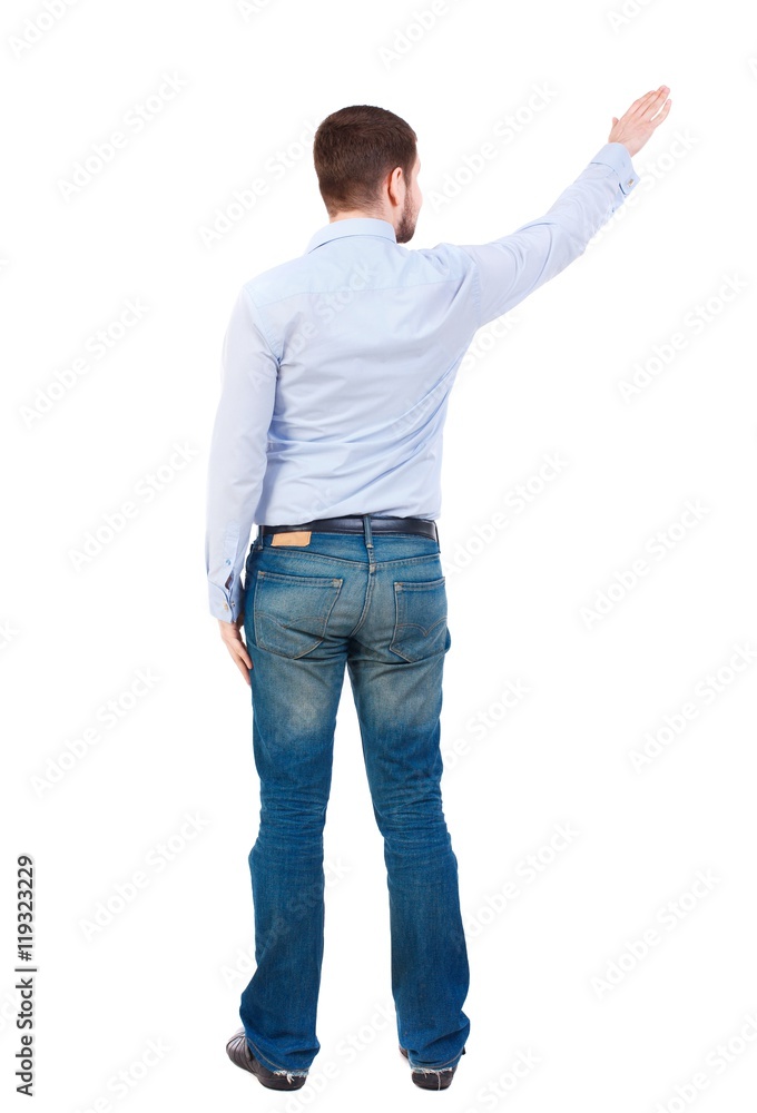 Back view of pointing business man. Bearded businessman showing his hand up. Back view of pointing business man. Bearded businessman showing his hand up.