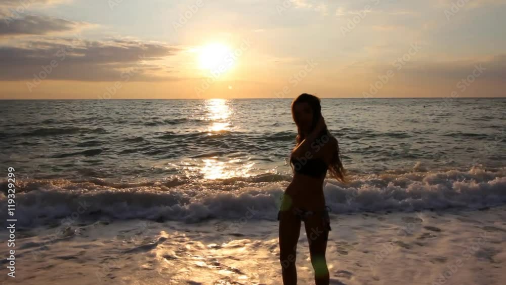 erochitnaya walk on the waves. Girl with long slender legs erochitnaya walk on the waves. Girl with long slender legs