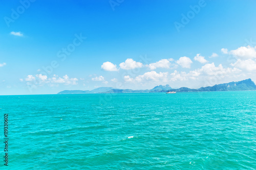 Landscape sea blue sky with white clouds floating in the sky.