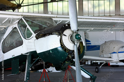 General prop aircraft motor maintenance in hangar