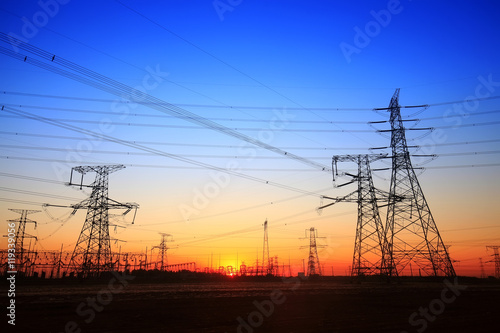 The silhouette of the evening electricity transmission pylon © zhengzaishanchu