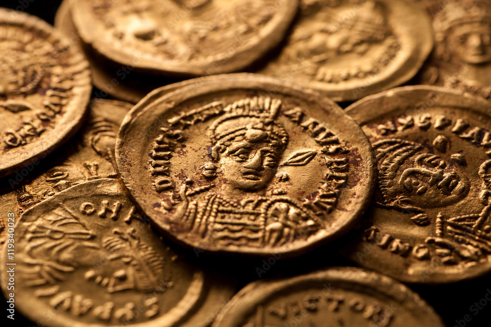 Ancient gold Byzantine coins with emperor portraits