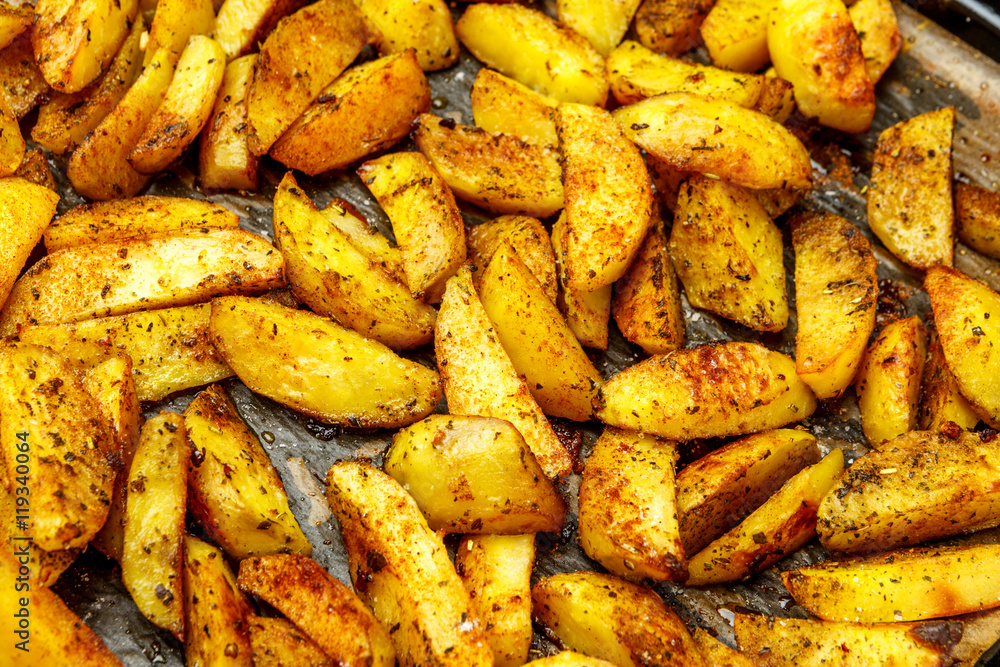 Baked potatoes with spices and salt baking sheet Baked potatoes with spices and salt baking sheet
