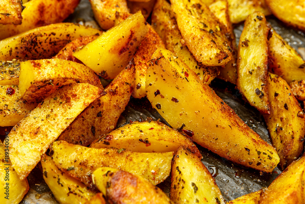 Baked potatoes with spices and salt baking sheet Baked potatoes with spices and salt baking sheet