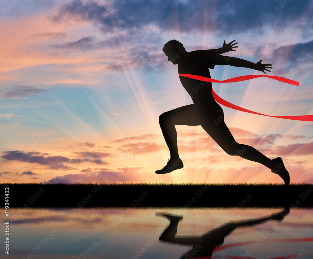 Running sports. Man runner and red tape Running sports. Man runner and red tape