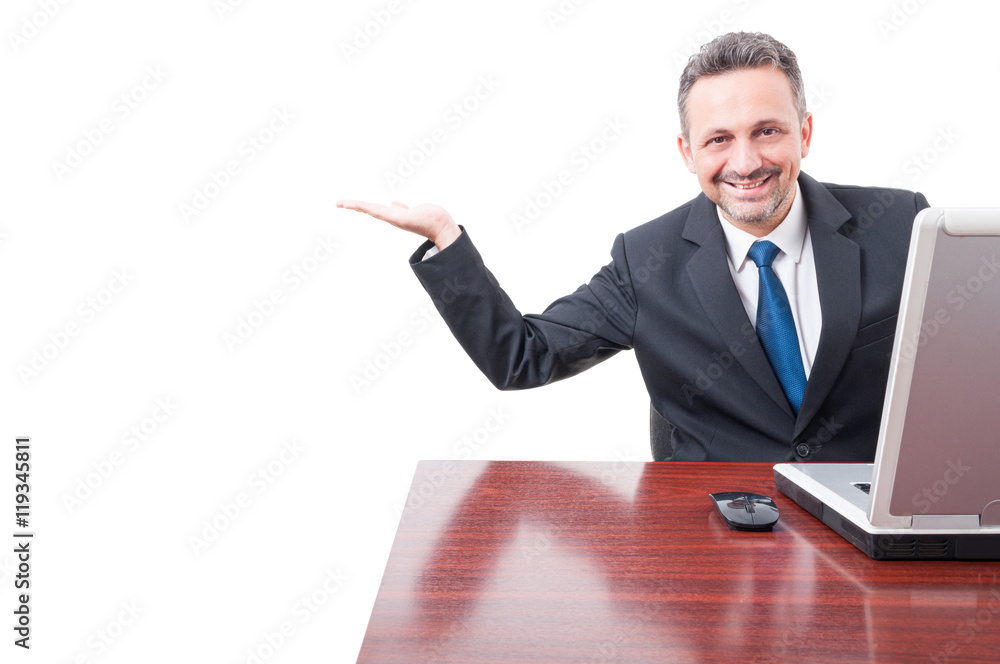 Happy smiling manager showing something or blank copyspace Happy smiling manager showing something or blank copyspace