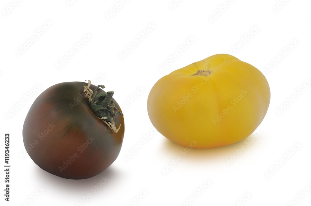One Kumato tomato yellow one isolated on white background One Kumato tomato yellow one isolated on white background